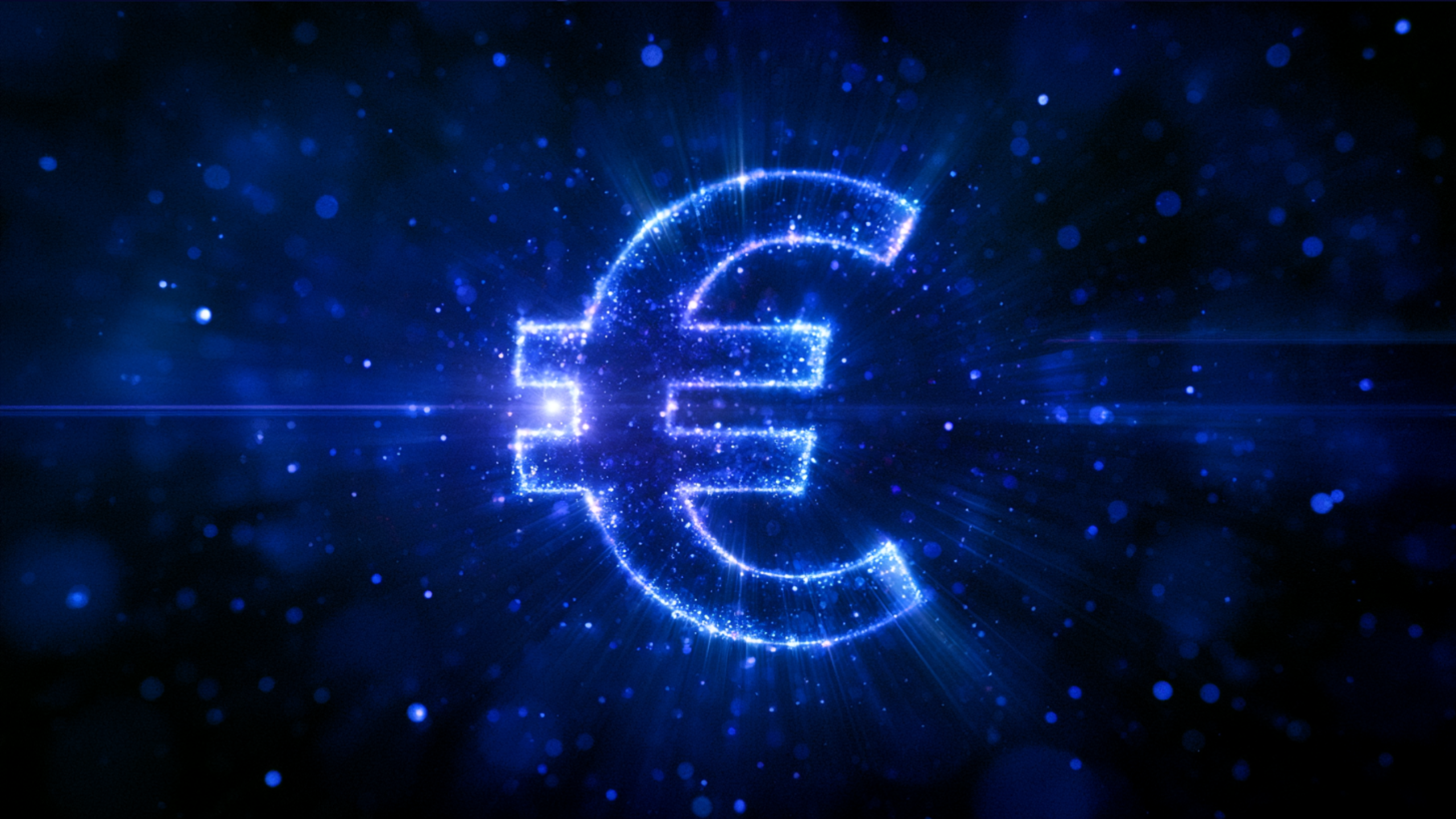Leuchtendes Euro Symbol auf dunklem Hintergrund